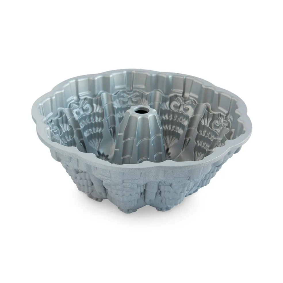 Molde Very Merry plateado Bundt Nordic Ware