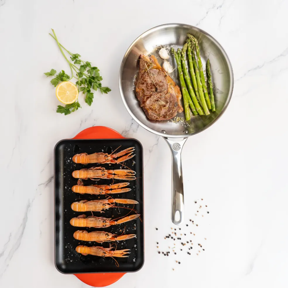Pack parrilla de hierro y sartén acero inoxidable Le Creuset