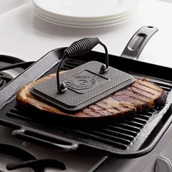 Prensa de parrilla de hierro rectangular Lodge